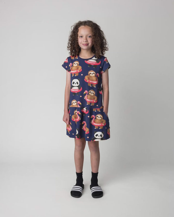 Kid wearing the Swimming Buddies Dress in midnight, full circle video